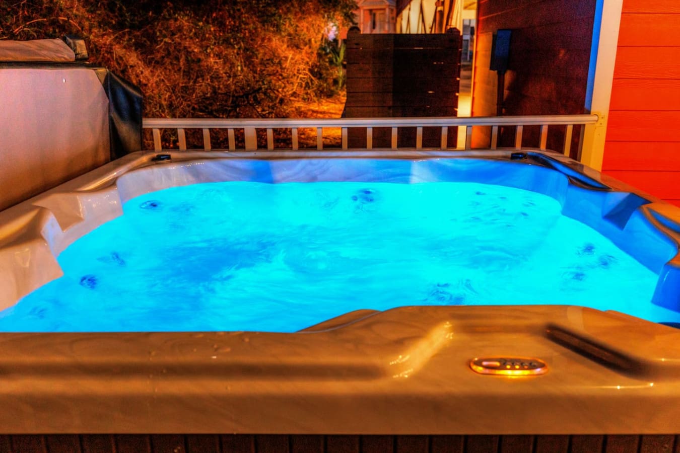 Nothing says "perfect night in" quite like soaking in your own glowing pool while the neighborhood lights twinkle around you and that warm evening glow wraps everything in magic.