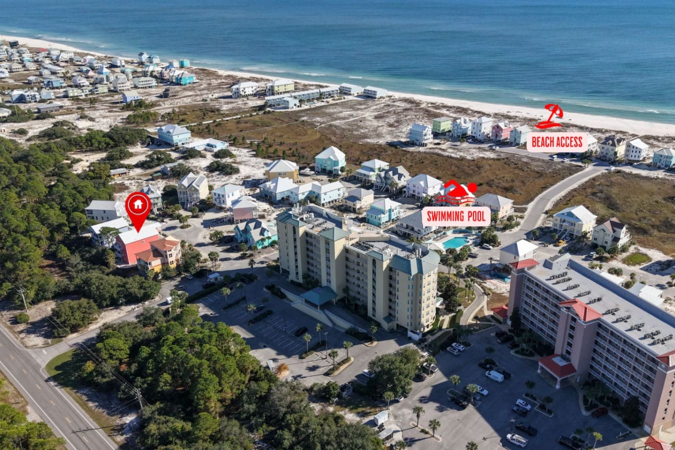 This beachside community has everything you need right here—your own pool, quick beach access, and enough colorful vacation homes around you to feel like you're part of something special.