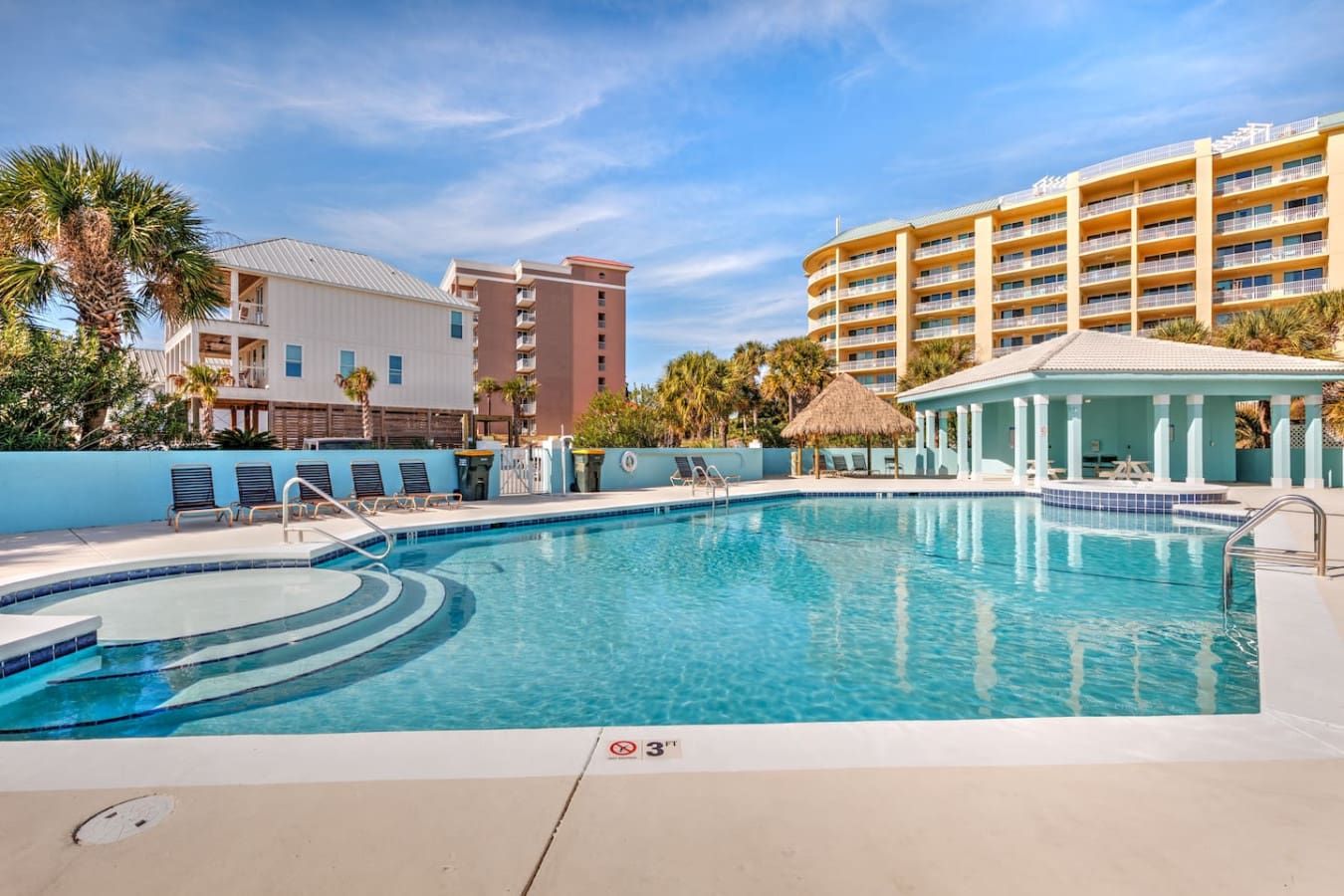 If you're dreaming of those lazy pool days surrounded by palm trees and sunshine, this is basically your backyard now.