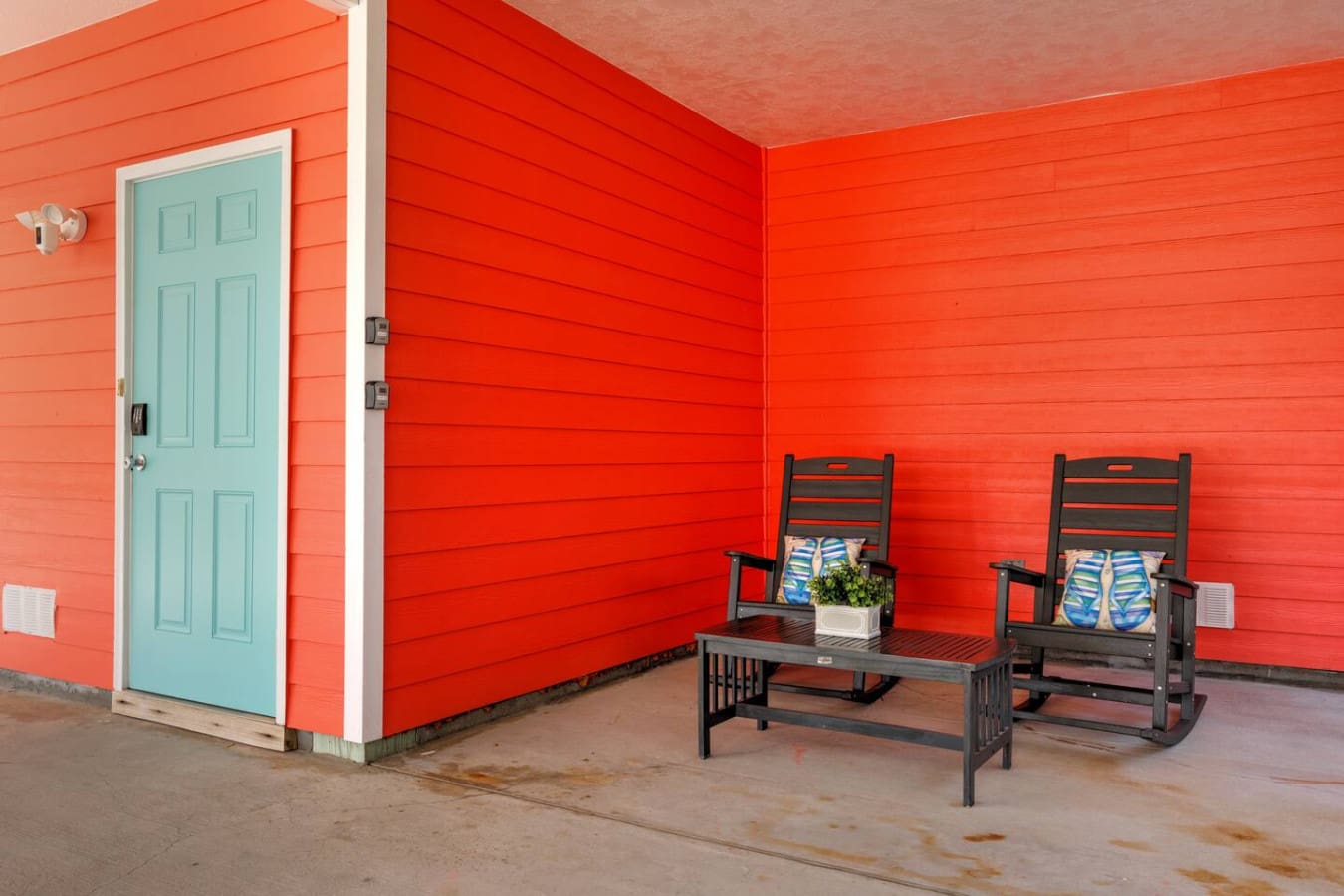 Your own little red beach cottage retreat with a front-row seat to sunset relaxation and those perfect rocking chair moments.
