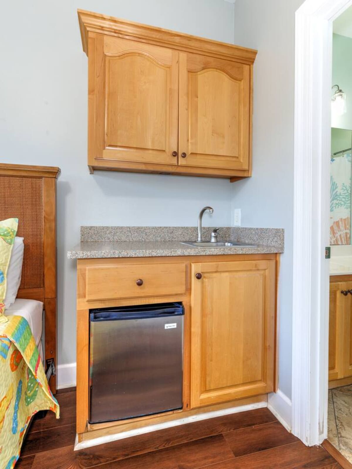 This cozy kitchenette tucked into the bedroom gives you everything you need for late-night snacks and morning coffee without having to leave your private retreat.