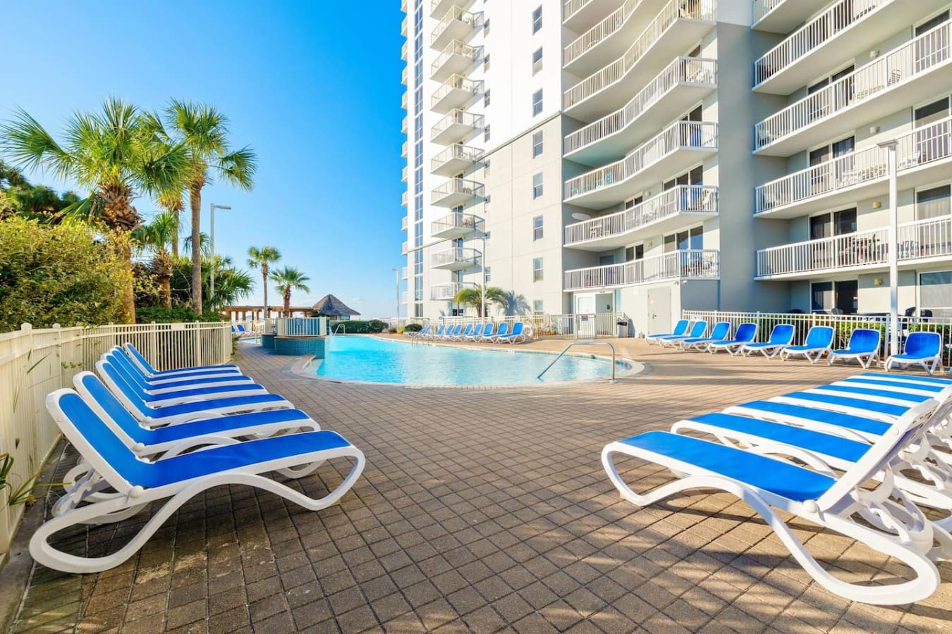 Snag one of these prime lounger spots poolside and you've basically got a front-row seat to the whole resort scene—sparkling water, swaying palms, and that Florida sun doing exactly what it's supposed to do.