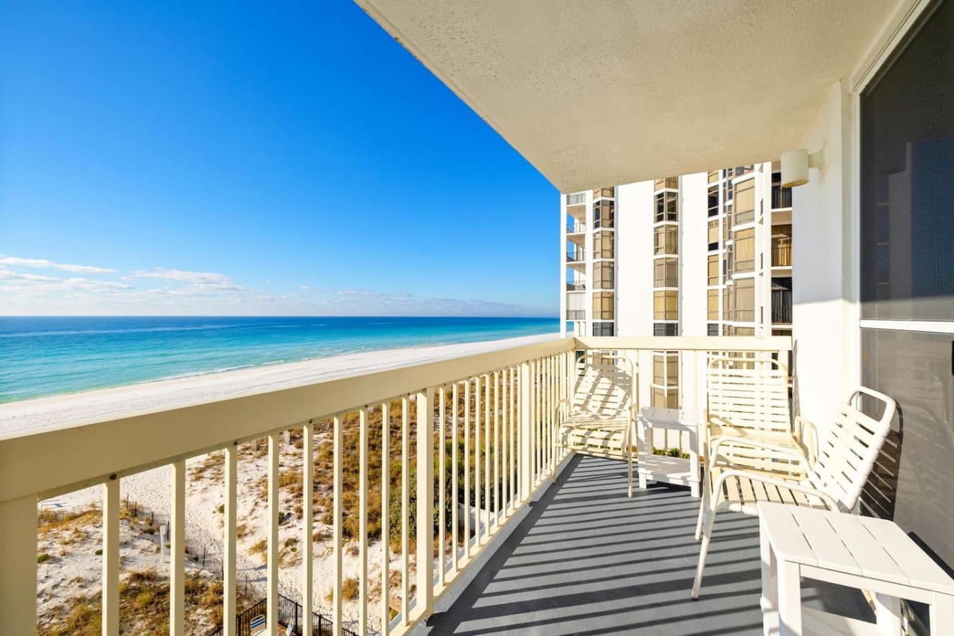 Wake up on your private balcony with nothing but endless ocean, pristine sand, and that impossibly blue sky stretching out before you—this is the view that makes you understand why people never want to check out.