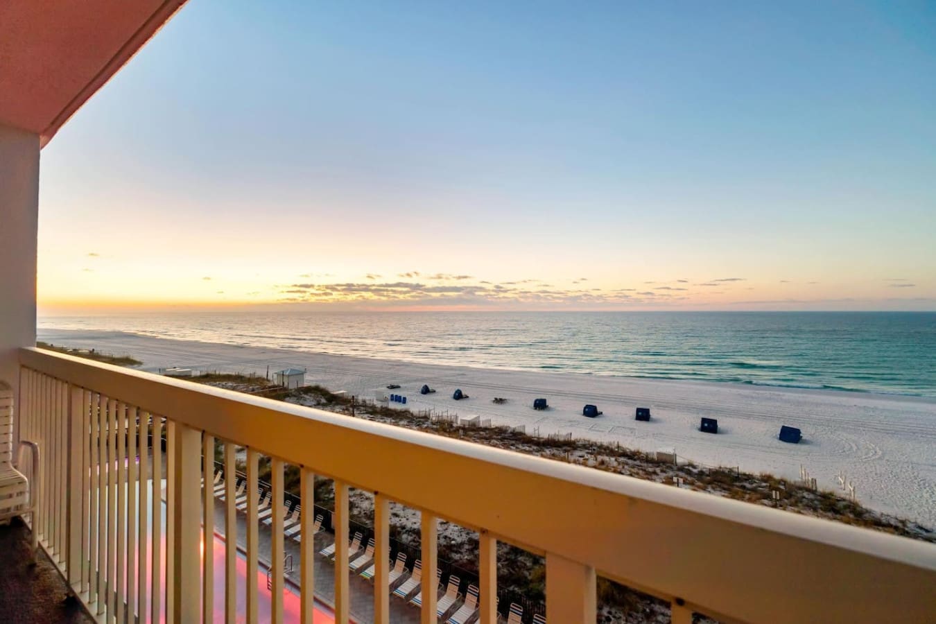 Sunrise at Pelican Beach Resort hits different when you're watching it unfold from your private balcony with nothing but sand, sea, and sky in front of you.