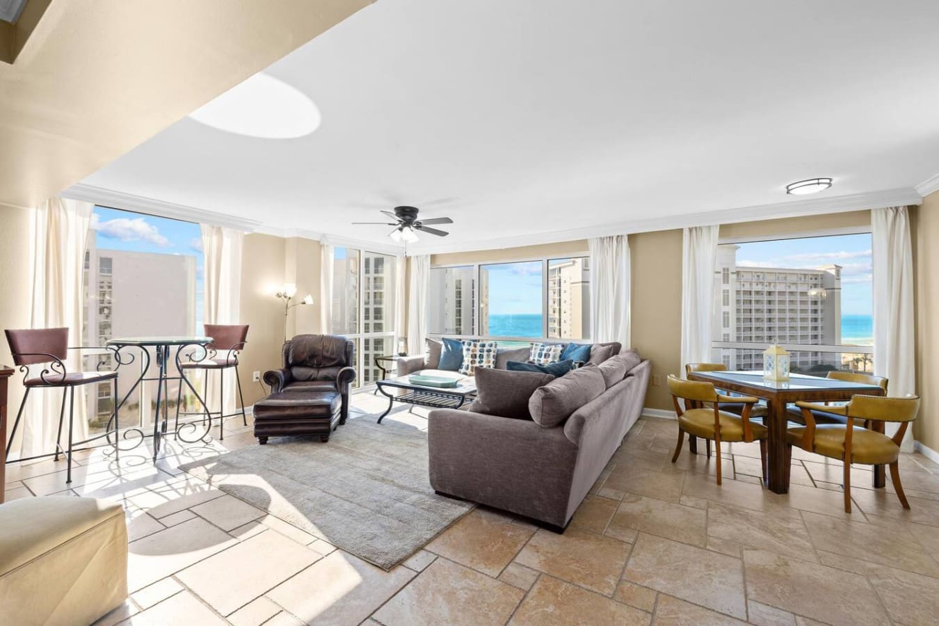 Open layout flowing seamlessly from the dining area to the living room, creating a spacious and connected atmosphere perfect for gathering and entertaining.