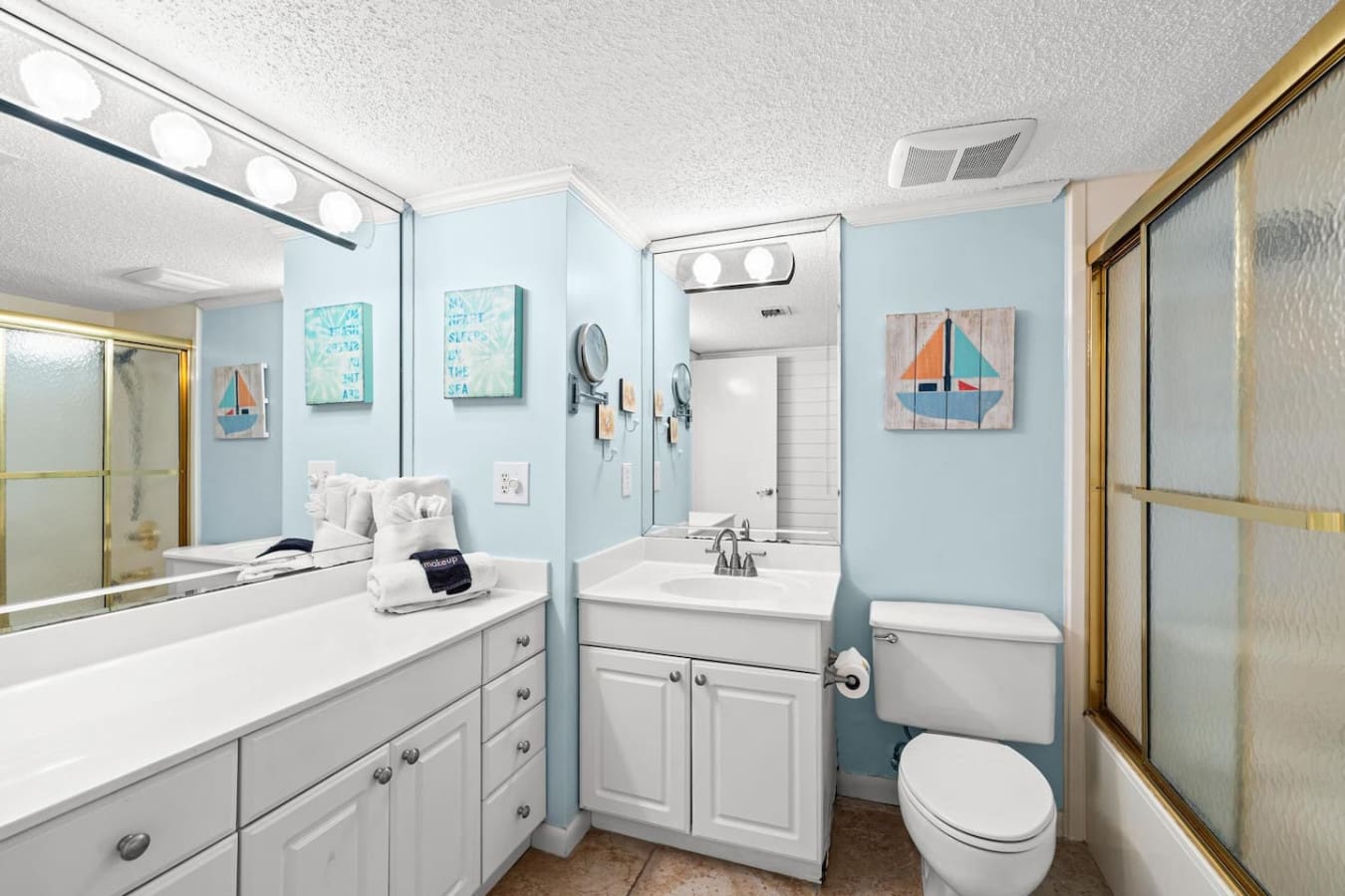 Modern bathroom designed for comfort and convenience, offering a clean and relaxing space to refresh during your stay.