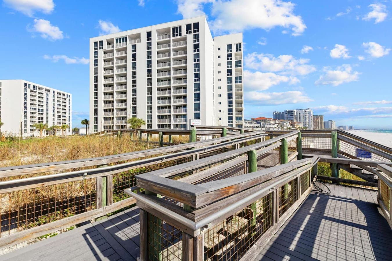 Convenient boardwalk leading directly to the beach, making it easy to enjoy a pleasant walk to the shoreline anytime.