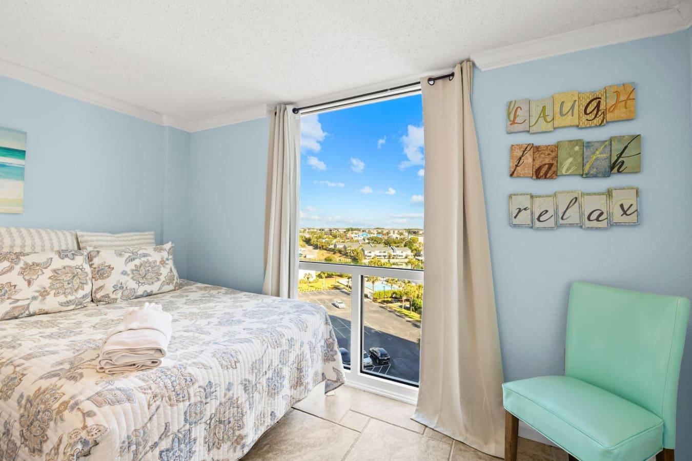 Bedroom featuring a private balcony with a beautiful view, allowing you to step outside and enjoy fresh air and scenic surroundings.
