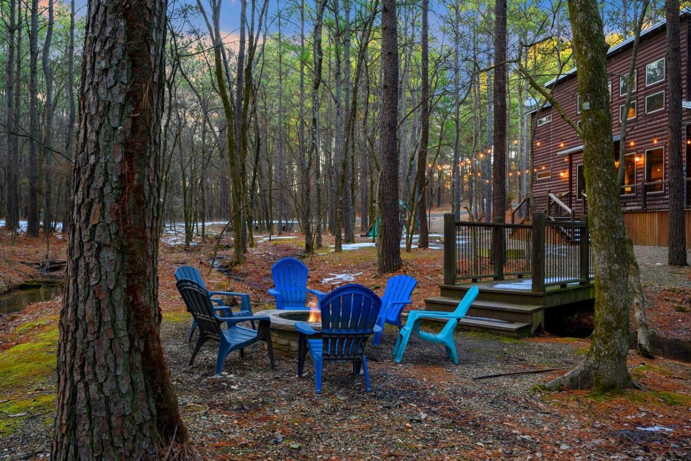 Gather around the fire pit with friends in a cozy woodland setting right outside your door.