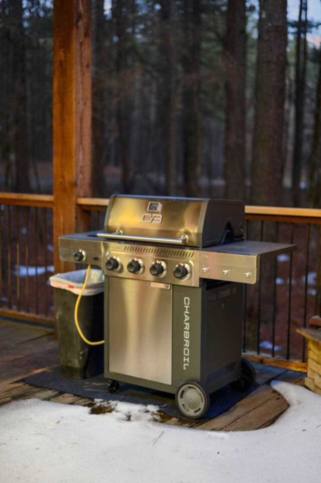Fire up the grill on your private forest deck with views of towering pines.