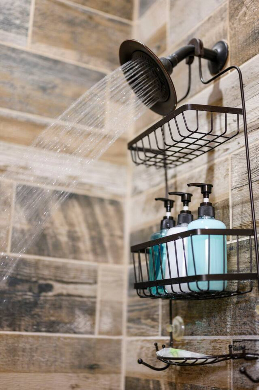 Rainfall showerhead with built-in shelving keeps your essentials within arm's reach during a luxurious shower experience.