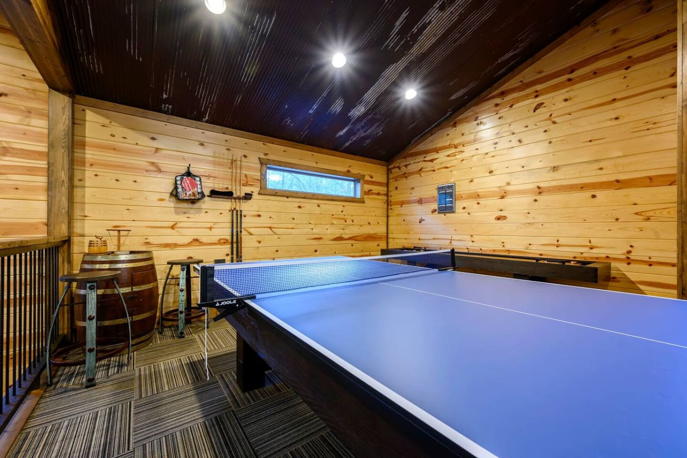 This game room has everything you need for indoor fun, with a ping pong table and plenty of space to hang out.