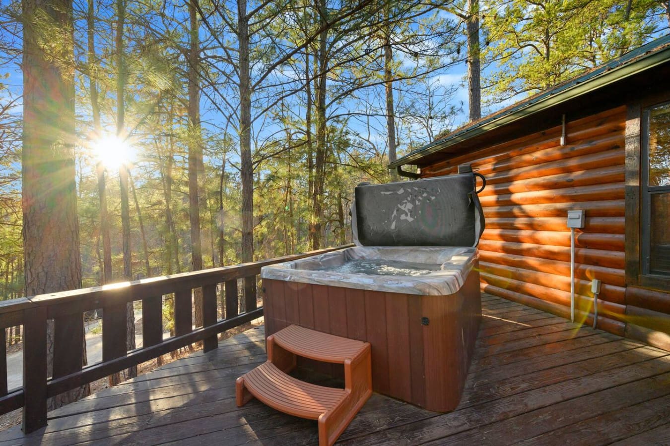 Nothing beats soaking in a hot tub surrounded by tall pines and endless forest views.