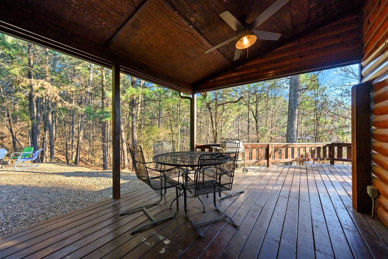 This covered deck is basically your own private forest retreat with plenty of room to relax and take in the views.