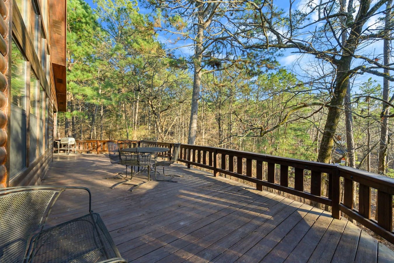 Wake up to a peaceful forest view from this expansive deck with plenty of room to relax and breathe.