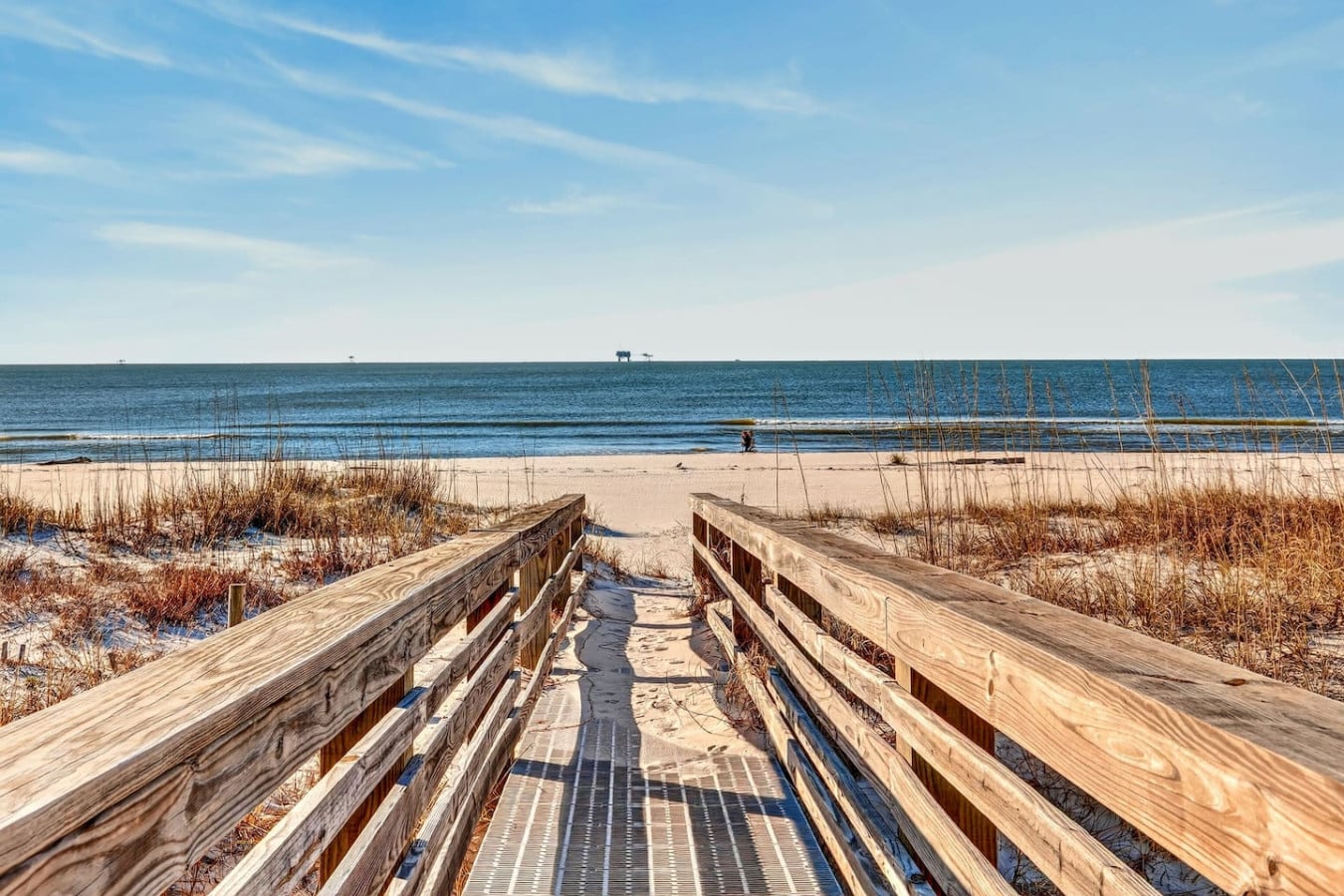 This wooden boardwalk leads straight to your own private slice of pristine beach and endless ocean views.