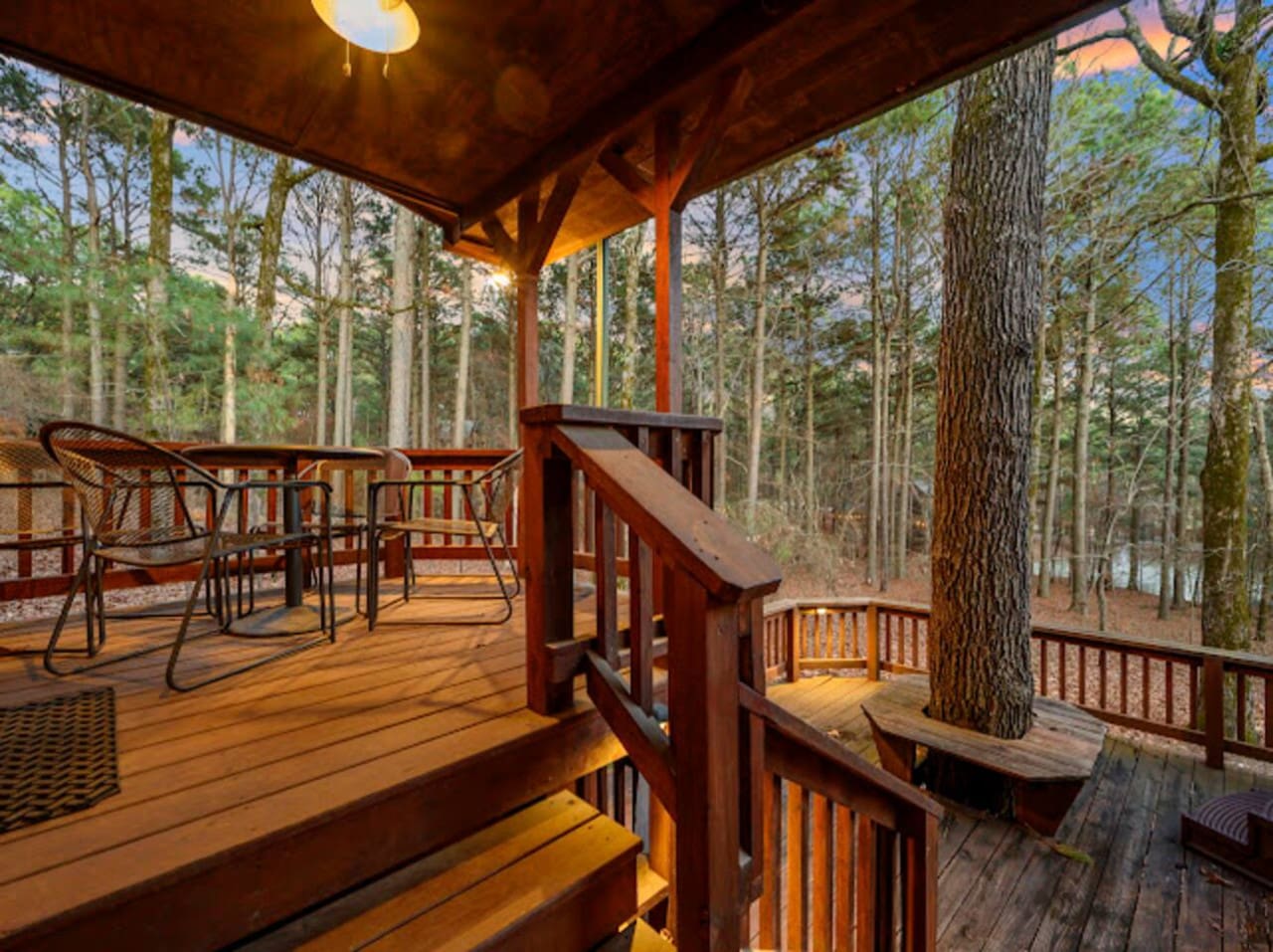 This covered deck is basically tree house vibes with plenty of space to kick back and soak in the forest views.