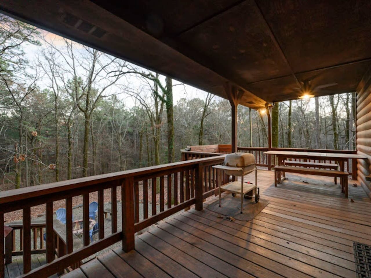 Wake up to forest views from this spacious covered deck with plenty of room to relax and unwind.