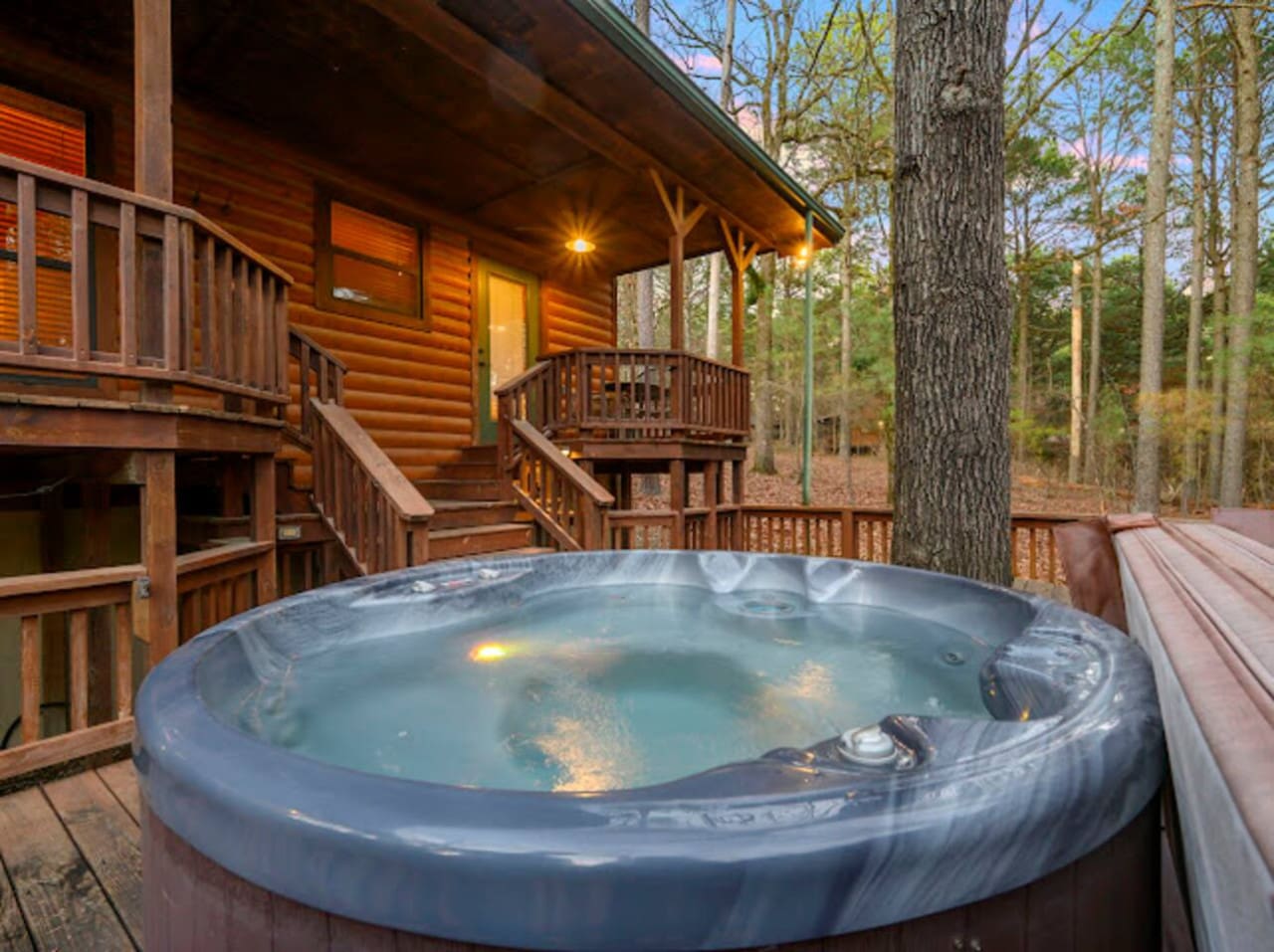Soak in the hot tub surrounded by tall pines and forest views from your private deck.