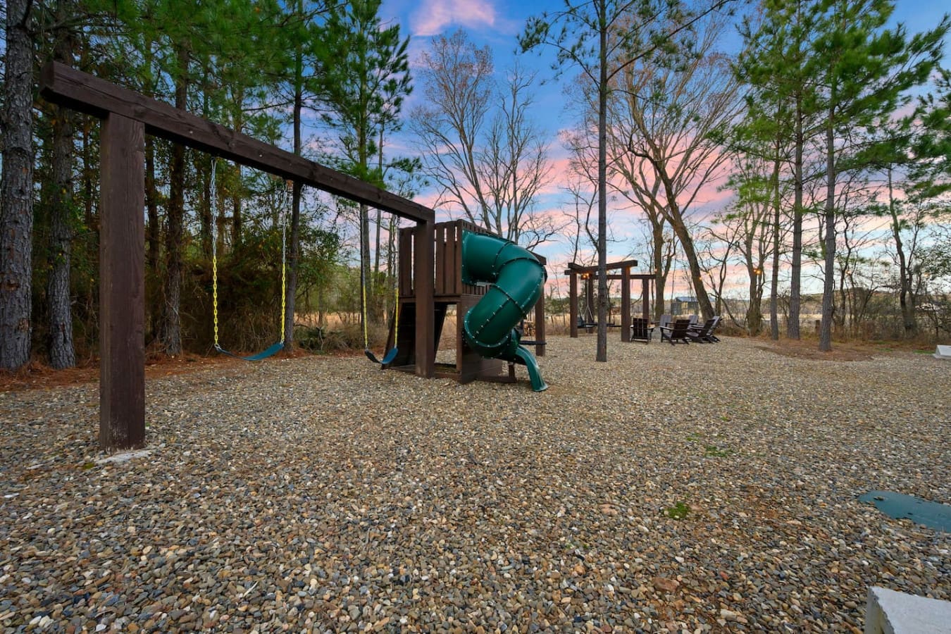 Perfect playground for the kids with plenty of space to run around and trees for shade.