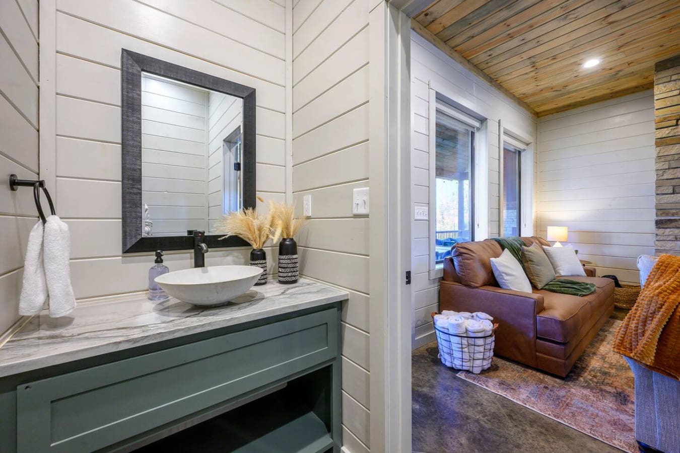 This luxe ensuite bathroom connects seamlessly to your cozy bedroom retreat with those gorgeous lake views.