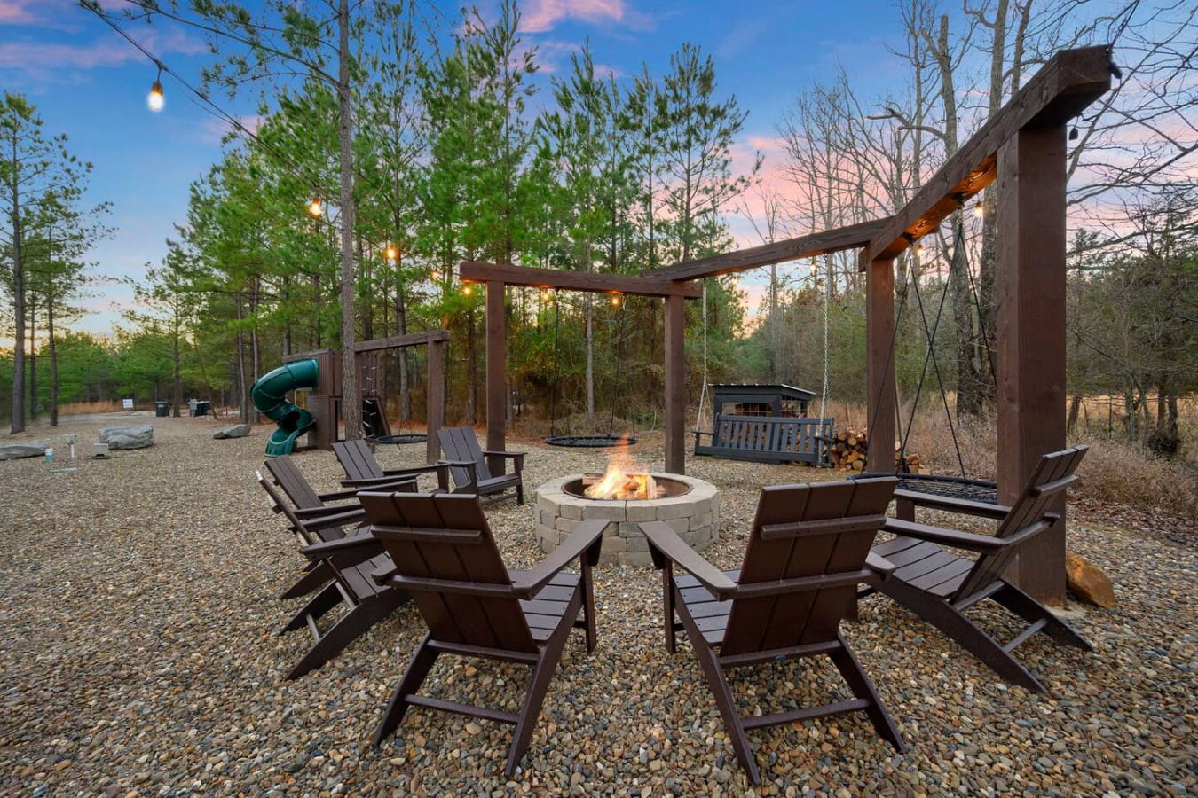 Perfect spot to gather around the fire pit under the stars with that gorgeous pergola overhead.