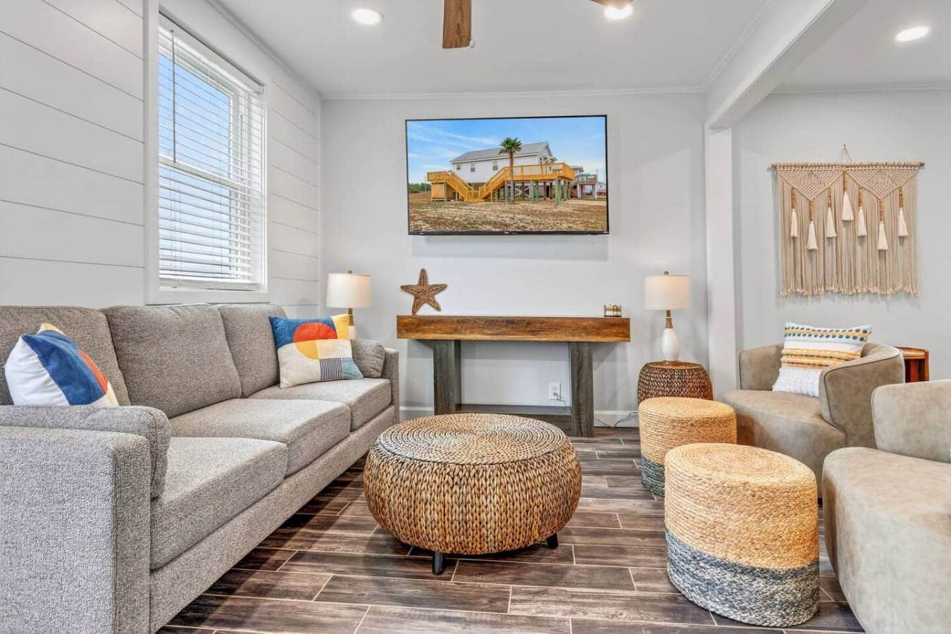 This bright, beachy living room is perfect for relaxing with family and friends during your coastal getaway.