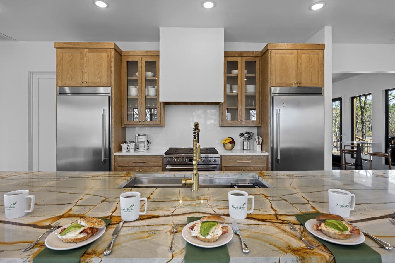Two full-size fridges, that stunning quartzite island, and a kitchen that actually handles a big group.