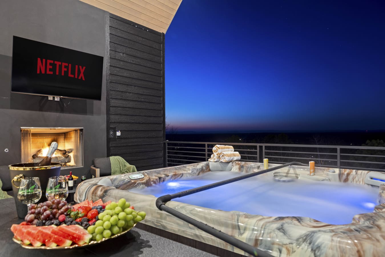 Soaking in the hot tub while the fireplace crackles and the sun sets over the hills.