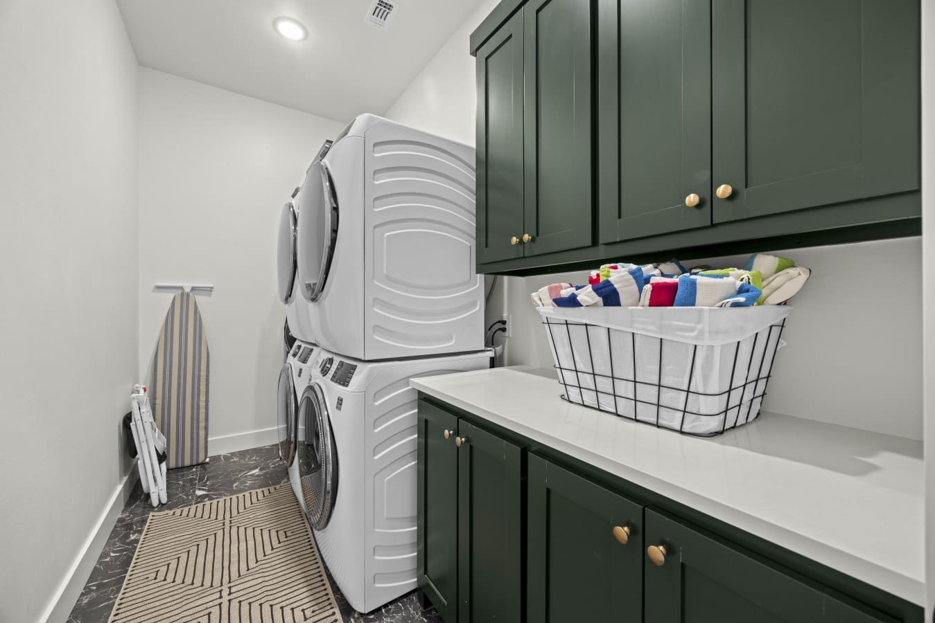 The laundry room has a stacked washer and dryer plus folding space, so you won't fall behind on towels.
