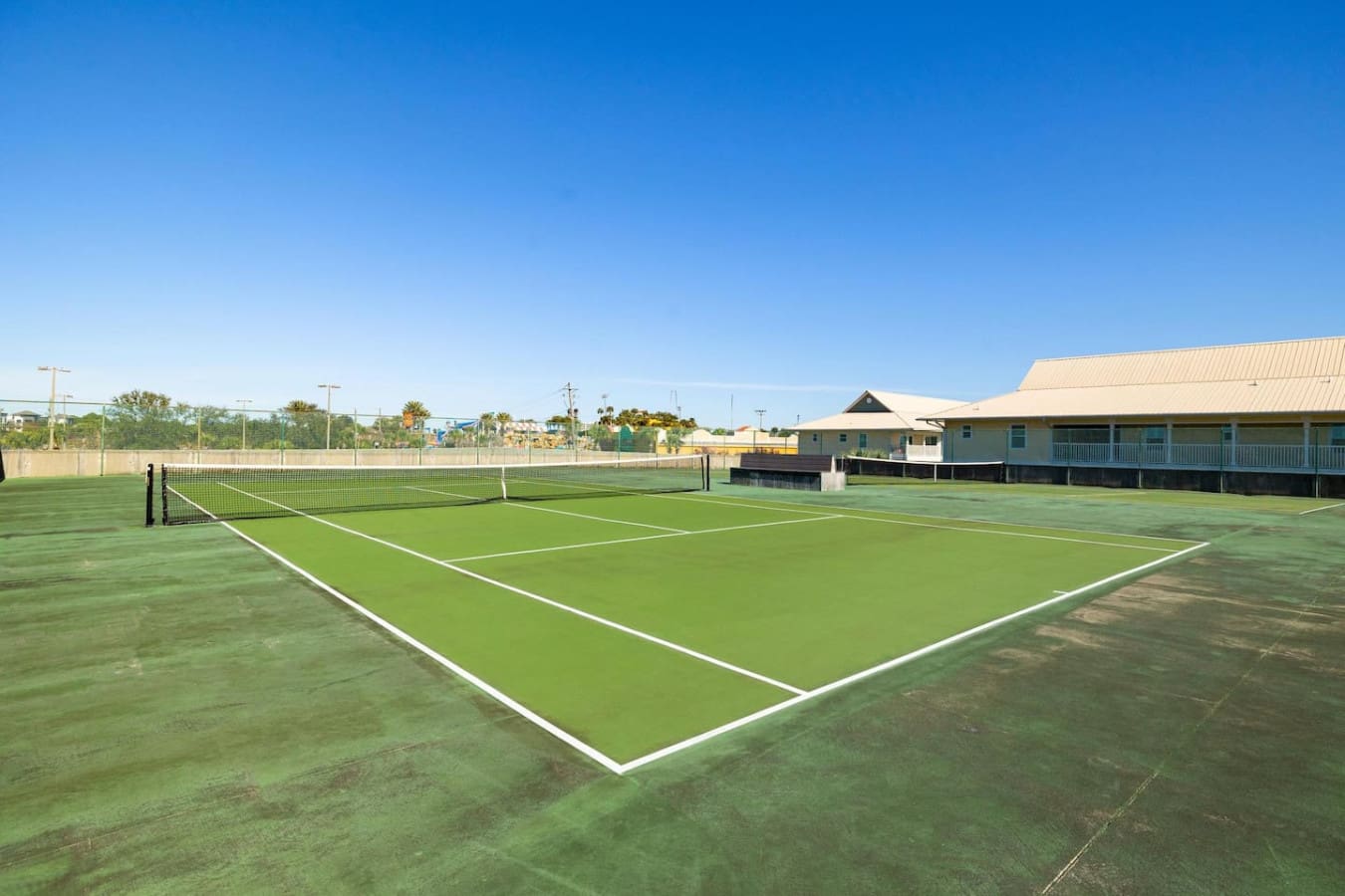 Whether you're rallying your crew for a friendly match or just enjoying some downtime between beach days, these pristine tennis courts are right there waiting for you.