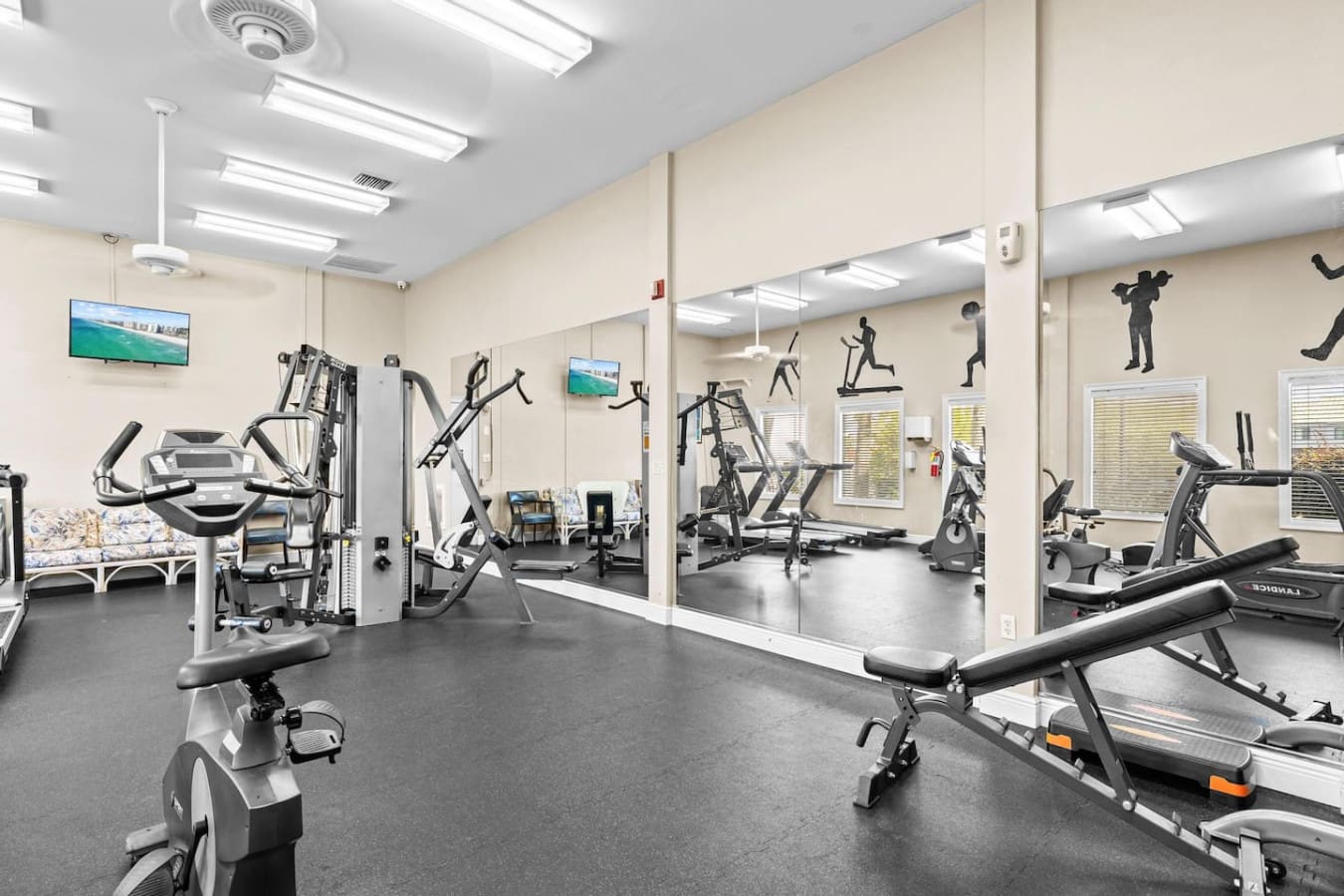 Fully equipped gym area, perfect for staying active and maintaining your workout routine while enjoying your stay.