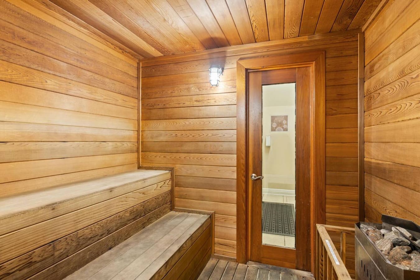 Relax and unwind in the soothing sauna area at Shoreline Towers, designed to help you refresh your body and enjoy a warm, calming retreat.
