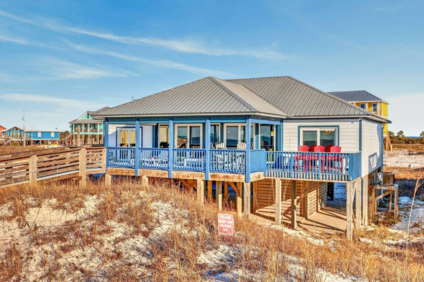 This gorgeous beachfront cottage sits right on the sand with stunning ocean views from your wraparound deck.