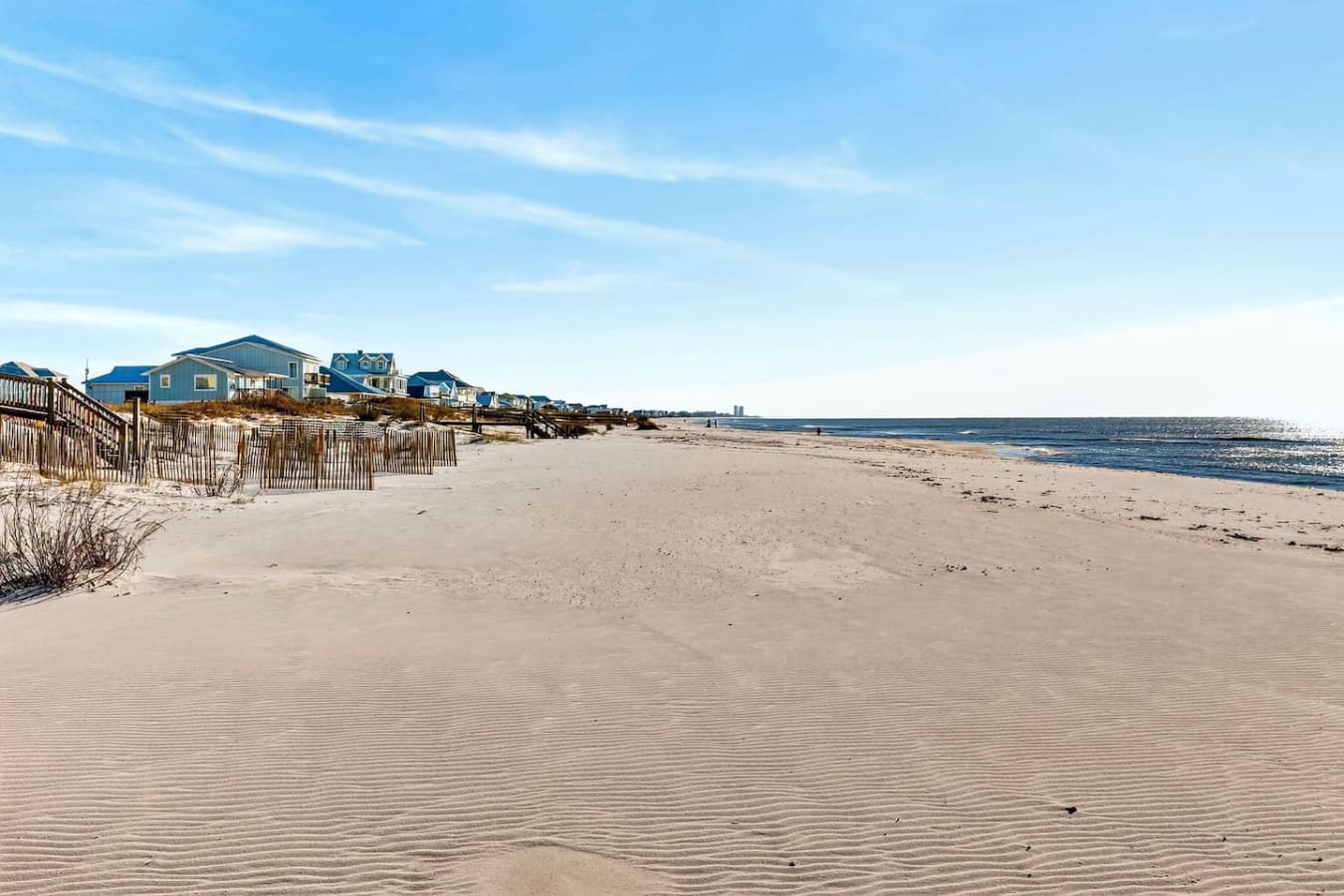 Nothing beats waking up to this pristine stretch of sandy beach right in your backyard.