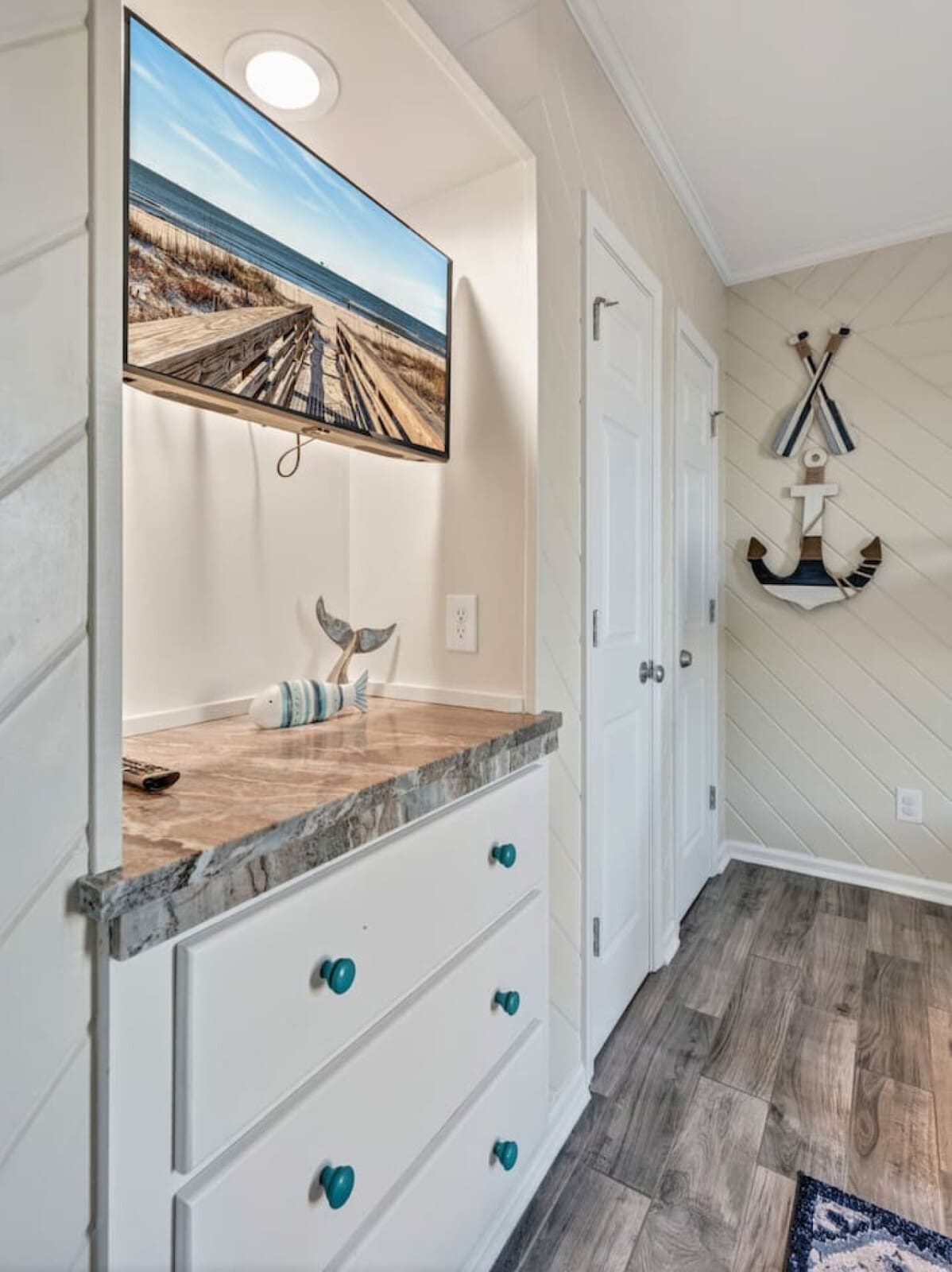 This cozy coastal nook with ocean views and nautical décor is the perfect spot to unwind.
