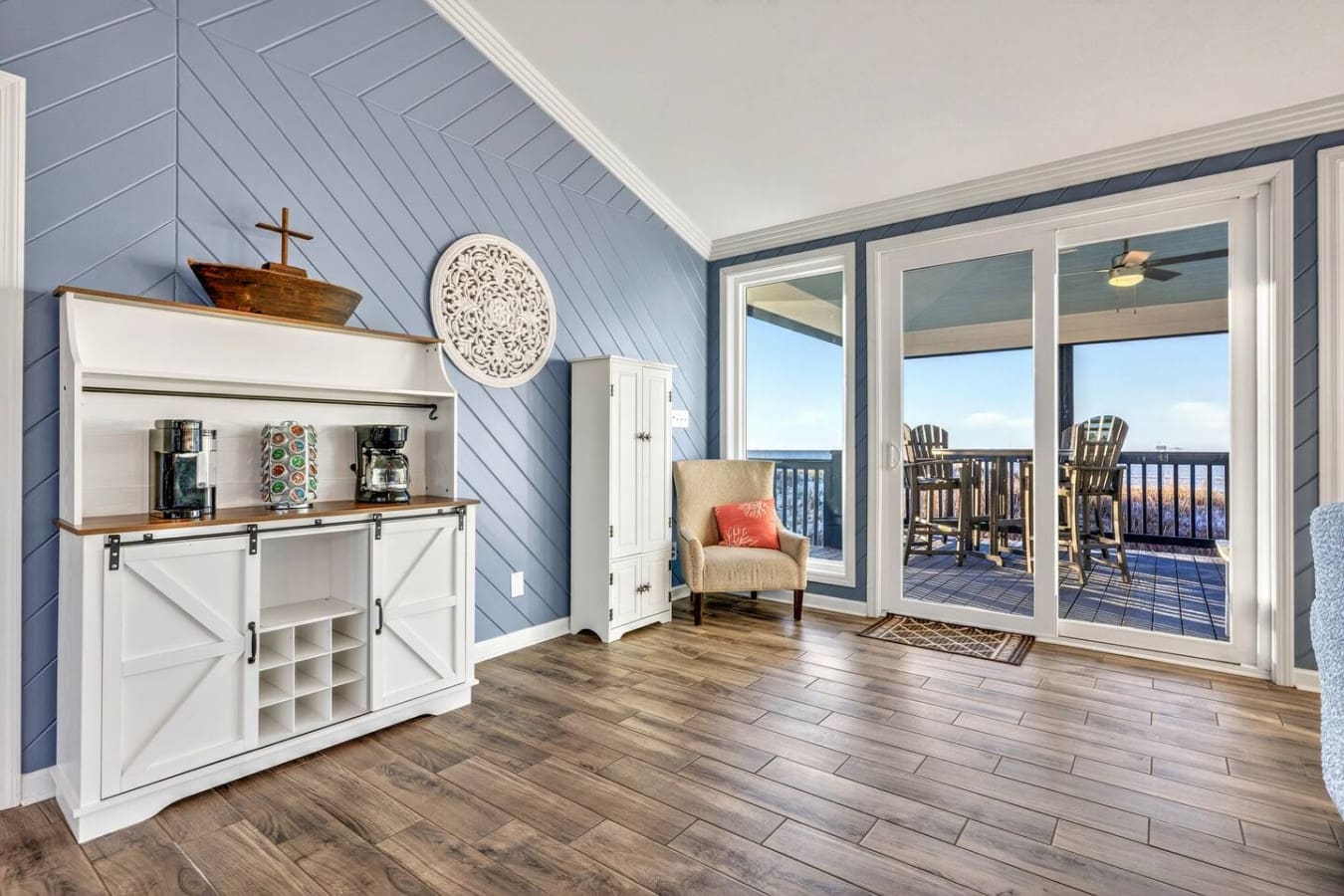 Wake up to endless ocean views from your private deck with direct access to this light-filled bedroom suite.