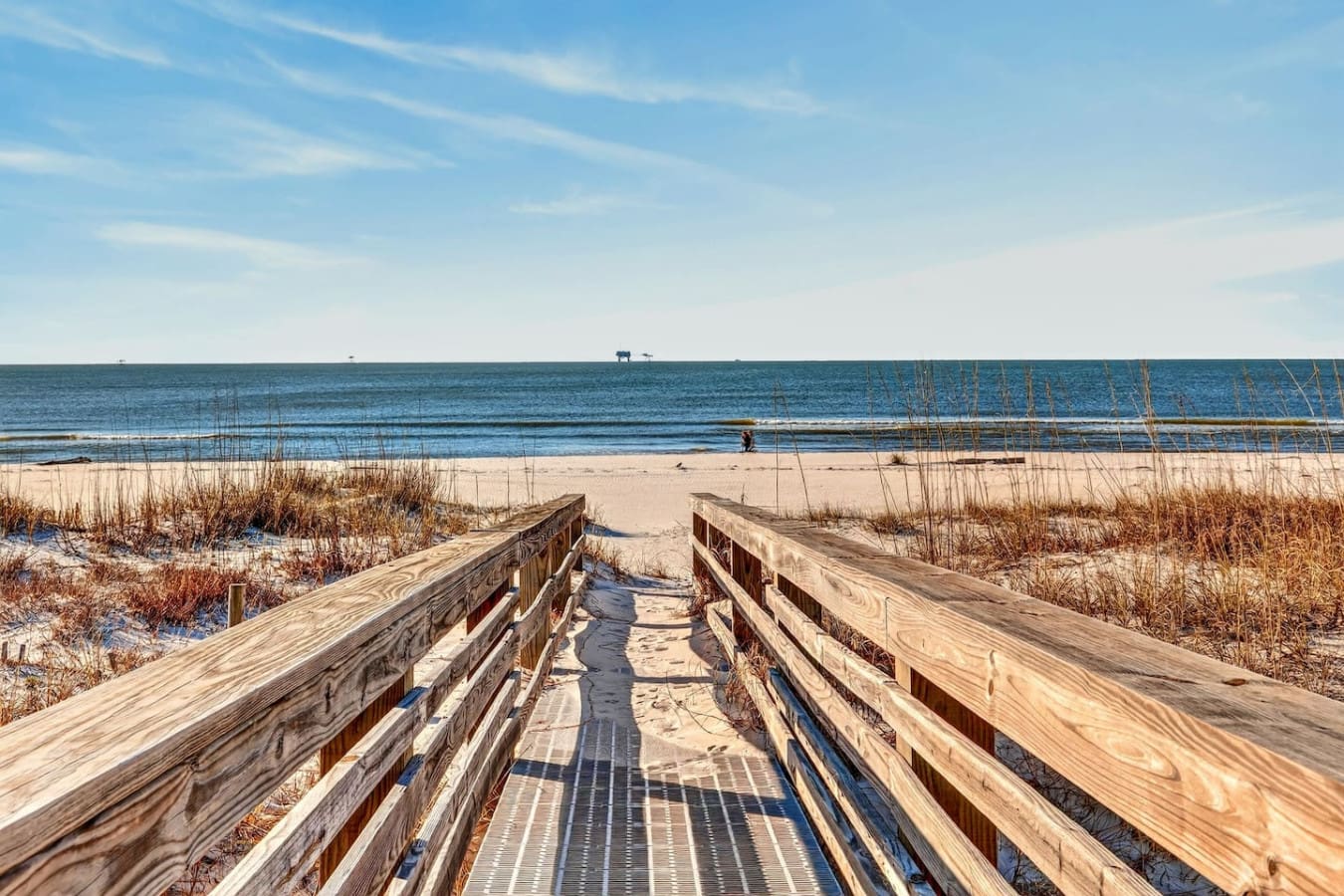 This wooden boardwalk leads straight to your own private slice of pristine beach and endless ocean views.