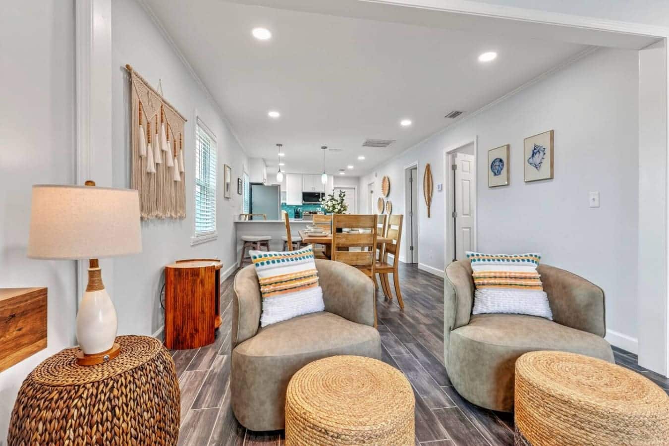 Open-concept living with comfy seating, natural light, and that perfect blend of coastal charm and modern comfort.