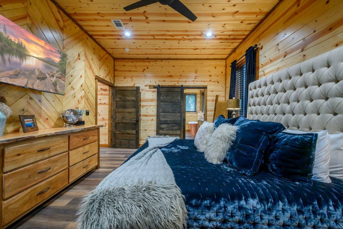 This gorgeous master suite combines rustic wood charm with upscale comfort and those dreamy views.