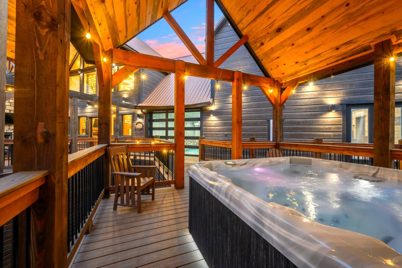 Nothing beats soaking in the hot tub under the stars from this covered deck.