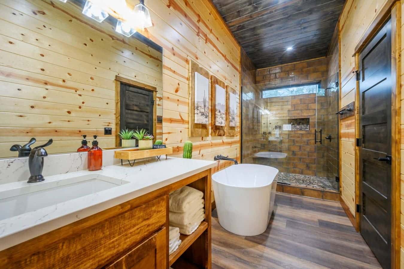 This primary bath is basically a spa with a soaking tub, double vanity, and a gorgeous walk-in shower.