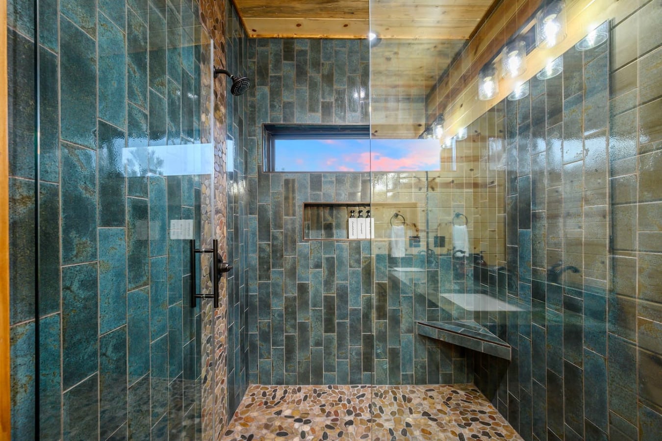 This spa-like shower has an incredible mountain view and heated floors that make you never want to leave.