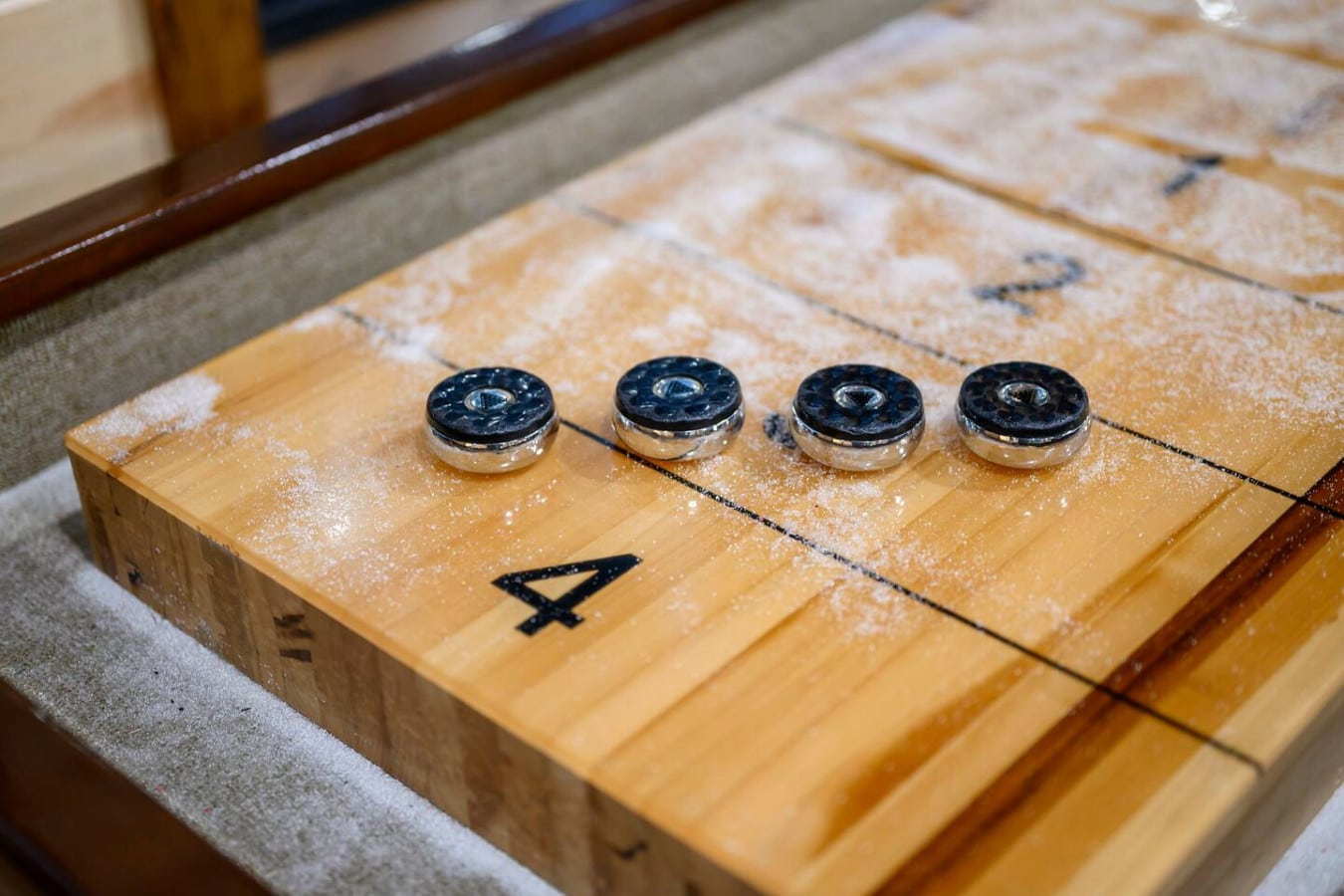 This stunning shuffleboard table is perfect for friendly competition right in your living space.