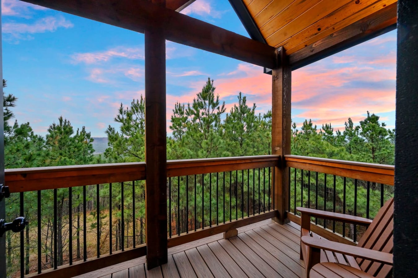 This covered deck offers stunning pine forest views and a perfect spot to watch the sunset roll in.
