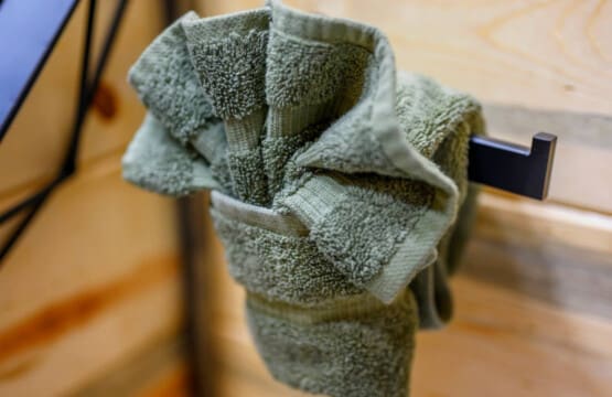 These plush towels rolled up and ready to go are basically the little detail that makes you feel like you're staying somewhere actually special.