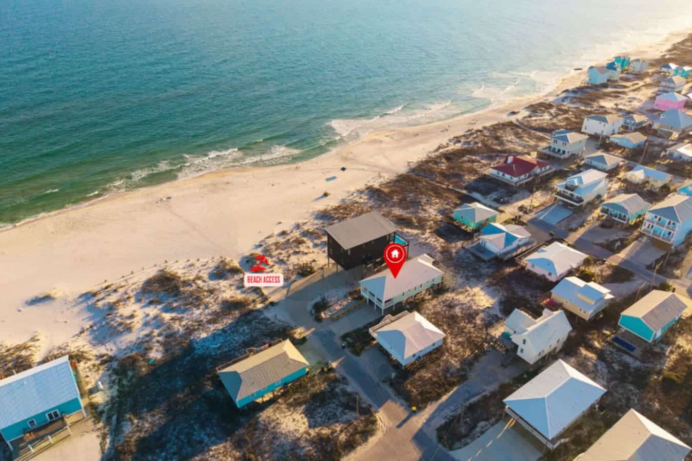 Nestled in a charming beach community with direct sand access and endless ocean views, this elevated beachfront home is basically your front-row seat to the perfect coastal escape.