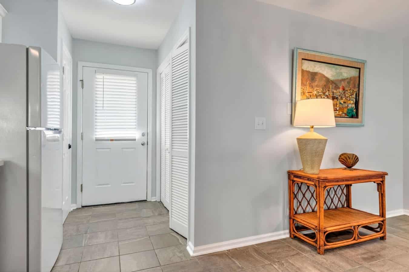 This bright, welcoming entryway sets the perfect tone for your stay—complete with easy beach access, smart storage solutions, and that breezy coastal vibe that makes you feel like you're already on vacation the moment you walk in.