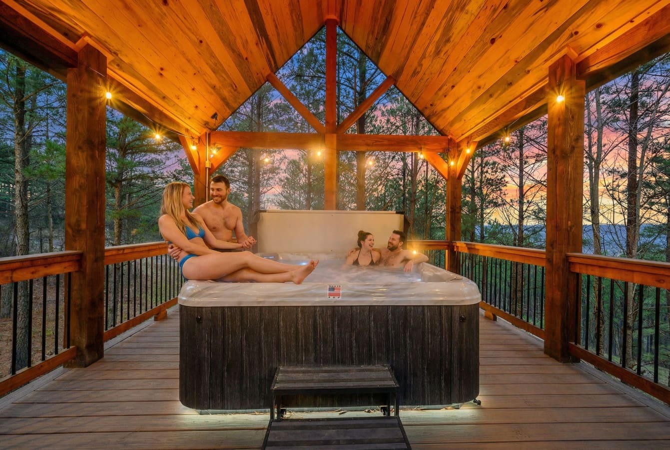 Soak under the stars in this gorgeous covered hot tub pavilion with forest views on every side.
