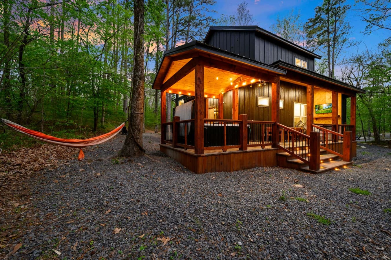 Relax outdoors on the spacious deck, perfect for enjoying the peaceful pond.